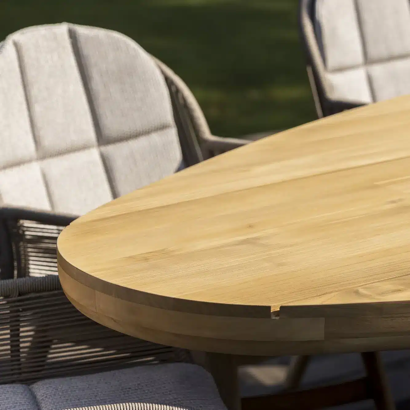 Teak Borek Bolzano collection table in outdoor setting