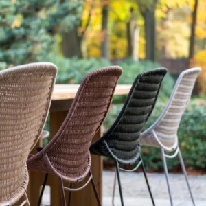 Max & Luuk Zamora chairs around a teak dining table