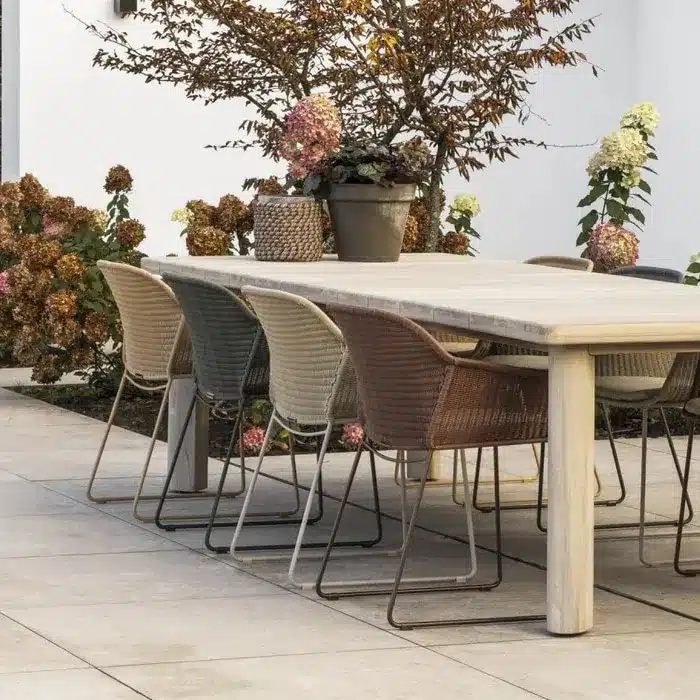 Max & Luuk Tarazona chairs around an outdoor dining table
